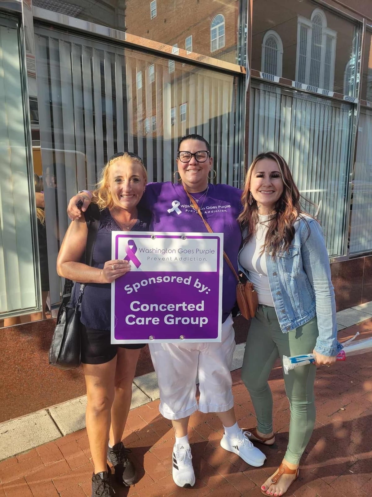 Girls hanging signs for WGP